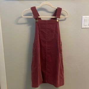 pink overall dress with short sleeve bodysuit